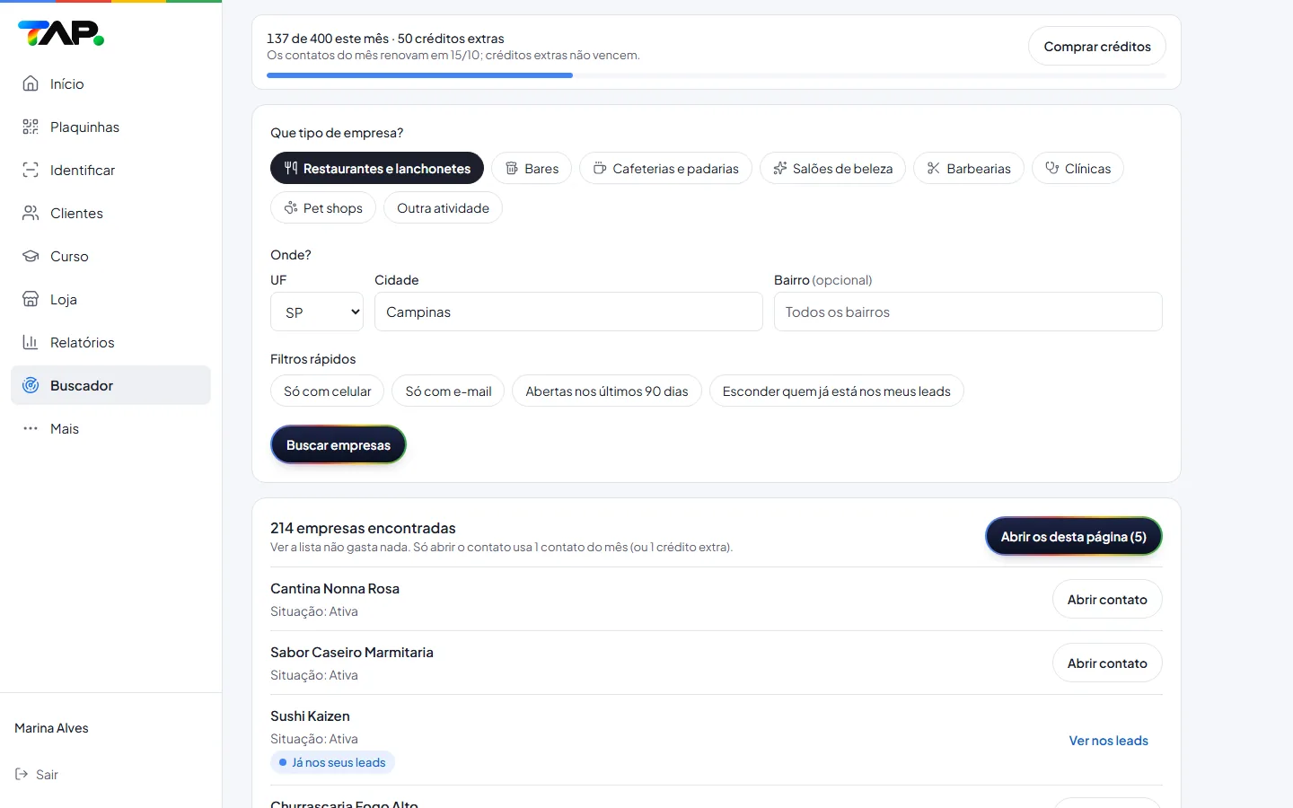 Buscador de Leads no computador: contador de contatos do mês e créditos extras, busca por restaurantes em Campinas com filtros rápidos e 214 empresas encontradas, cada uma com o botão Abrir contato